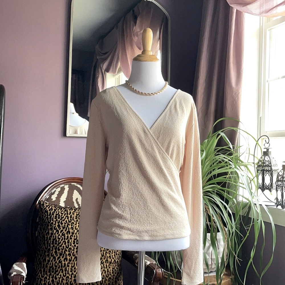 Cream top long sleeve v neck blouse